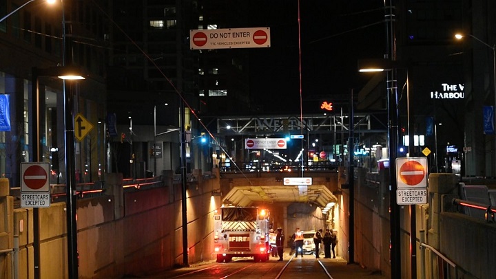 A vehicle becomes lodged in the Queen's Quay streetcar tunnel overnight Sunday.