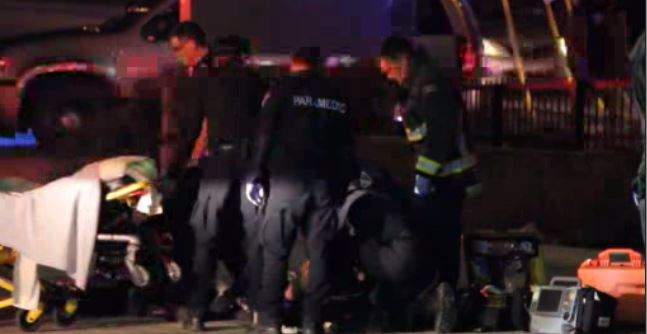 Surrey RCMP and paramedics treat a teenage stabbing victim.