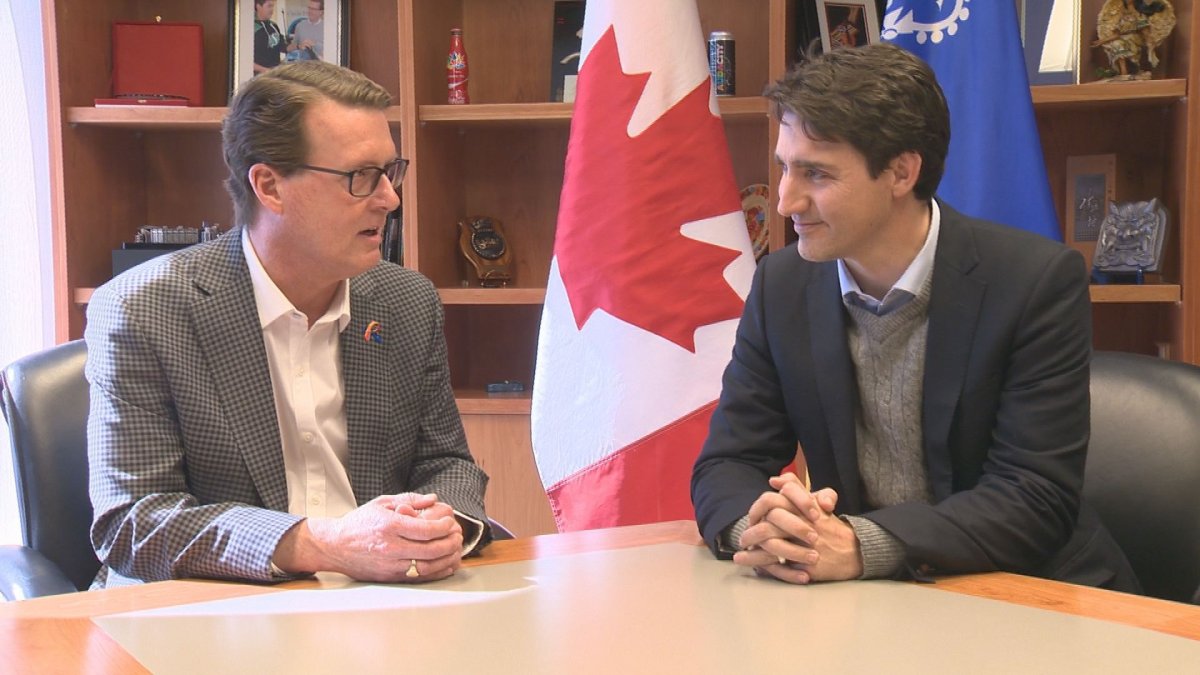 Mayor Michael Fougere and Prime Minister Justin Trudeau meet in Regina. 