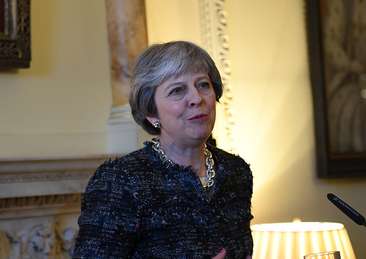 British Prime Minister Theresa May speaks during a reception at Downing Street on March 8, 2018 in London, England. 