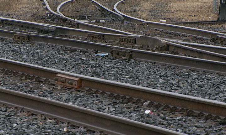 A report from city staff says moving the rail lines is a long shot.