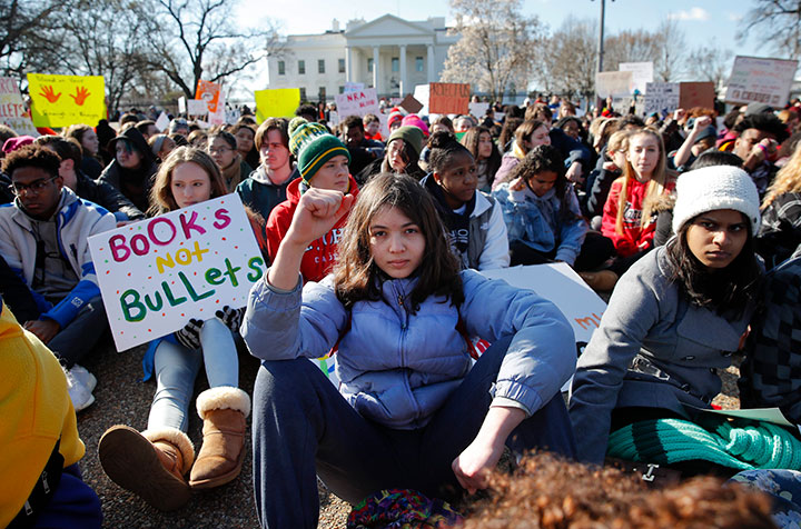Students rally in front of the White House in Washington, Wednesday, March 14, 2018.