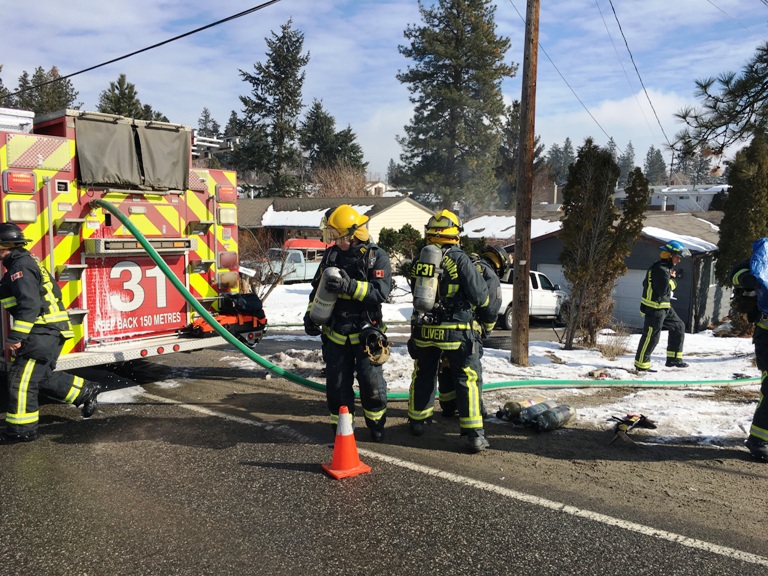 Woman arrested after West Kelowna house fire - image
