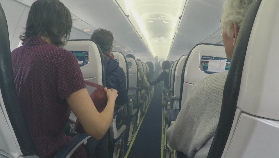 Video shows WestJet cabin filling with smoke as plane lands in