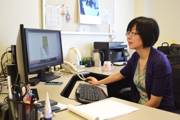 Apparently lightning can strike the same place twice after all. A new study done by the University of Calgary suggests that with the use of satellite data and artificial intelligence it's possible to predict where lightning is at a greater risk to trigger wildfires. Dr. Xin Wang is seen at her desk at the University of Calgary in a Monday, March 5, 2018, handout image. 