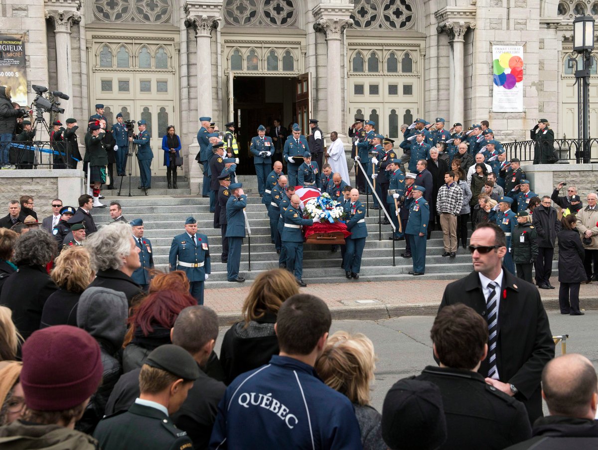 The casket of warrant officer Patrice Vincent leaves the church after funeral services November 1, 2014 in Longueuil, Quebec. On social media, Othman Hamdan allegedly called Vincent's killer a "hero." THE CANADIAN PRESS/Ryan Remiorz.