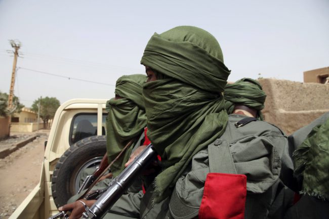 Malian troops join with former Tuareg rebels during a joint patrol in Gao, Mali, Feb. 23, 2017.