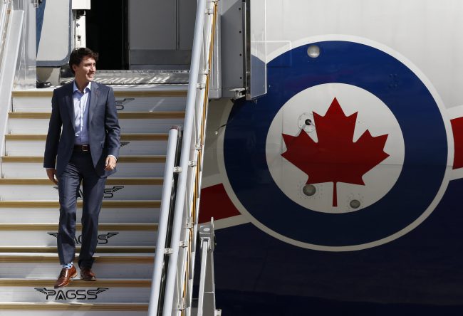 Prime Minister Justin Trudeau descends a plane's angway as he arrives at the Clark International Airport in Pampanga province, north of Manila, Philippines 12 November 2017.