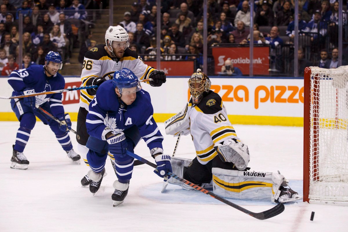 Toronto Maple Leafs centre Leo Komarov (47) misses a shot on Boston Bruins goaltender Tuukka Rask (40) during second period NHL hockey action in Toronto on Saturday, February 24, 2018.