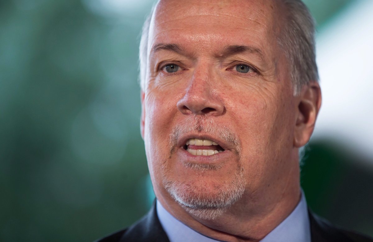 British Columbia Premier John Horgan speaks during an announcement about child care, at a daycare in Coquitlam, B.C., on Wednesday March 28, 2018.