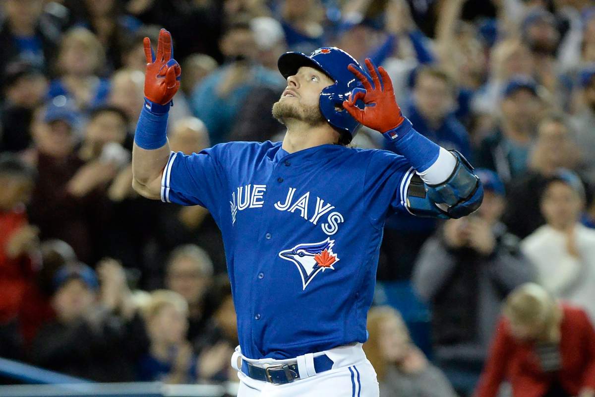 Toronto Blue Jays third baseman Josh Donaldson (20) celebrates his solo home run during sixth inning American League baseball action in Toronto on Monday, April 2, 2018. 