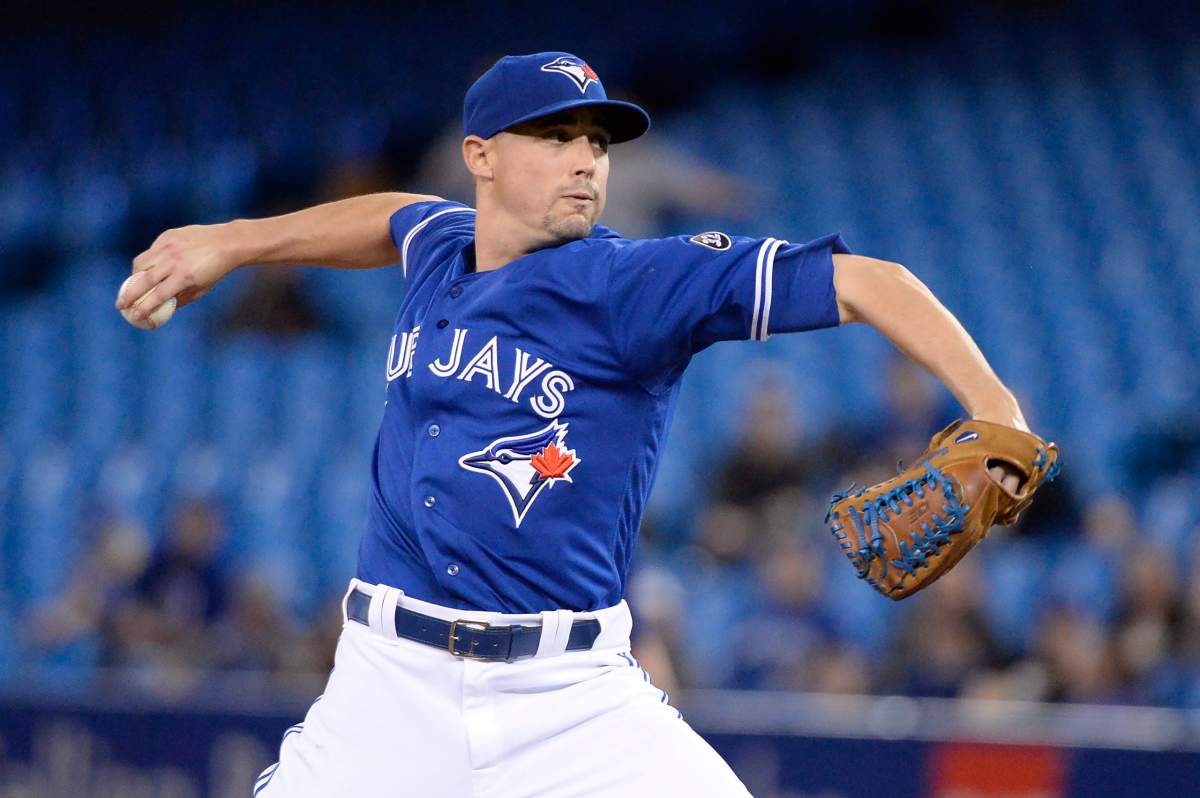 Toronto Blue Jays starting pitcher Aaron Sanchez (41) pitches to the Chicago White Sox during first inning American League baseball action in Toronto on Wednesday, April 4, 2018. 