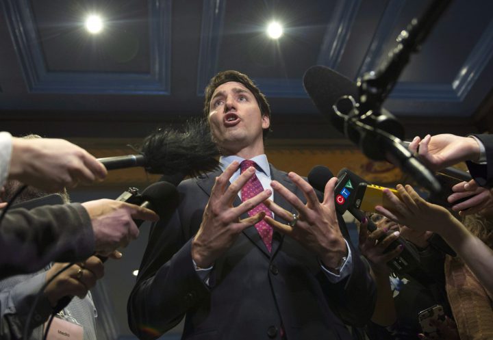 Prime Minister Justin Trudeau responds to reporters questions after speaking at the GBC Resource Efficiency Workshop B7, as part of the G7 meeting, April 5 in Quebec City. 