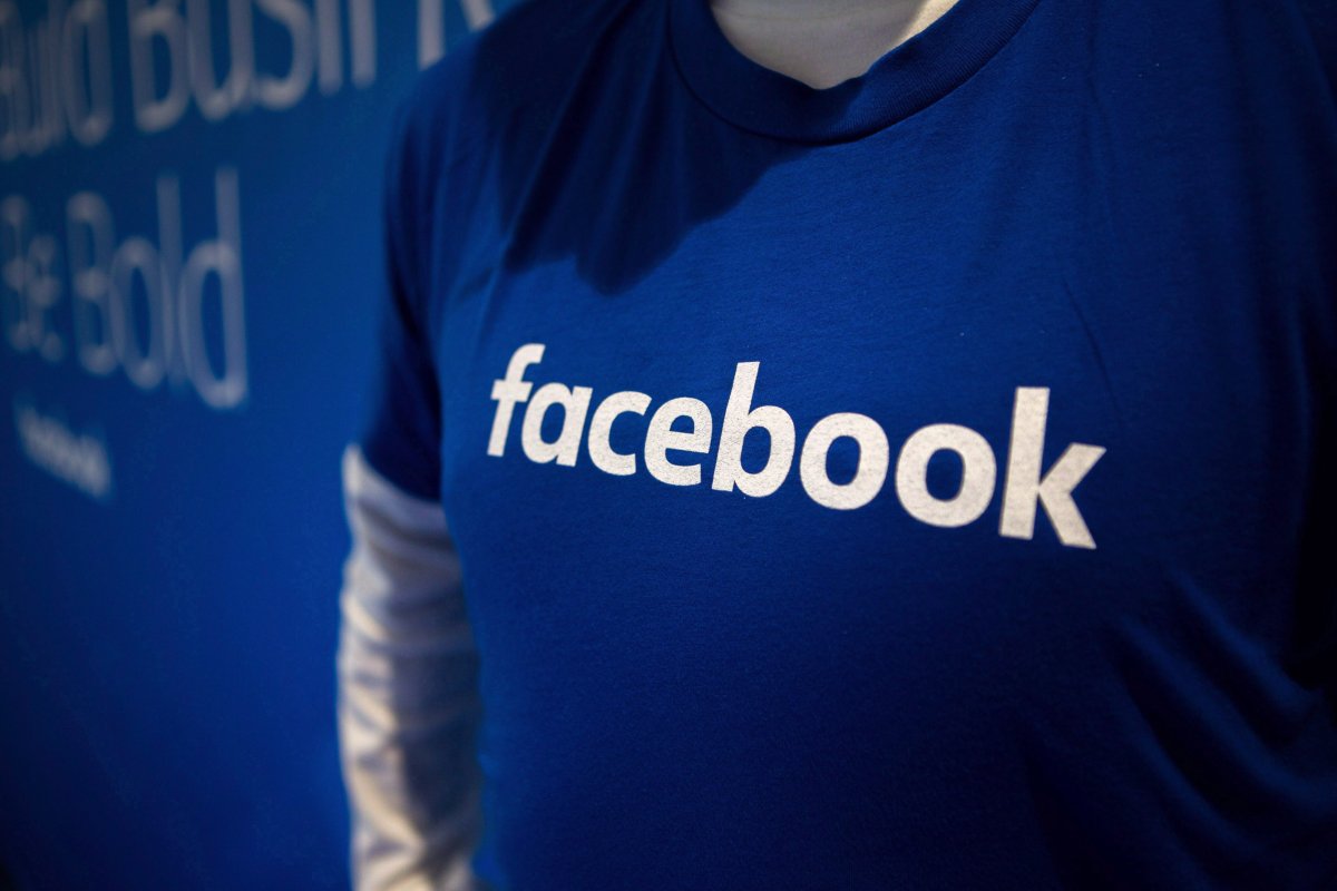 Guest are welcomed by people in Facebook shirts as they arrive at the Facebook Canadian Summit in Toronto on March 28, 2018. 