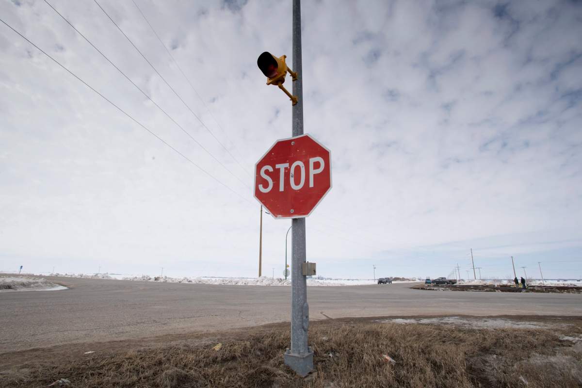 The stop sign on highway 335 is seen at the intersection of highway 35 near Tisdale, Sask., Tuesday, April, 10, 2018. This is the intersection where a bus carrying the Humboldt Broncos hockey team crashed into a truck en route to Nipawin for a game Friday night killing 15 and sending over a dozen more to the hospital.