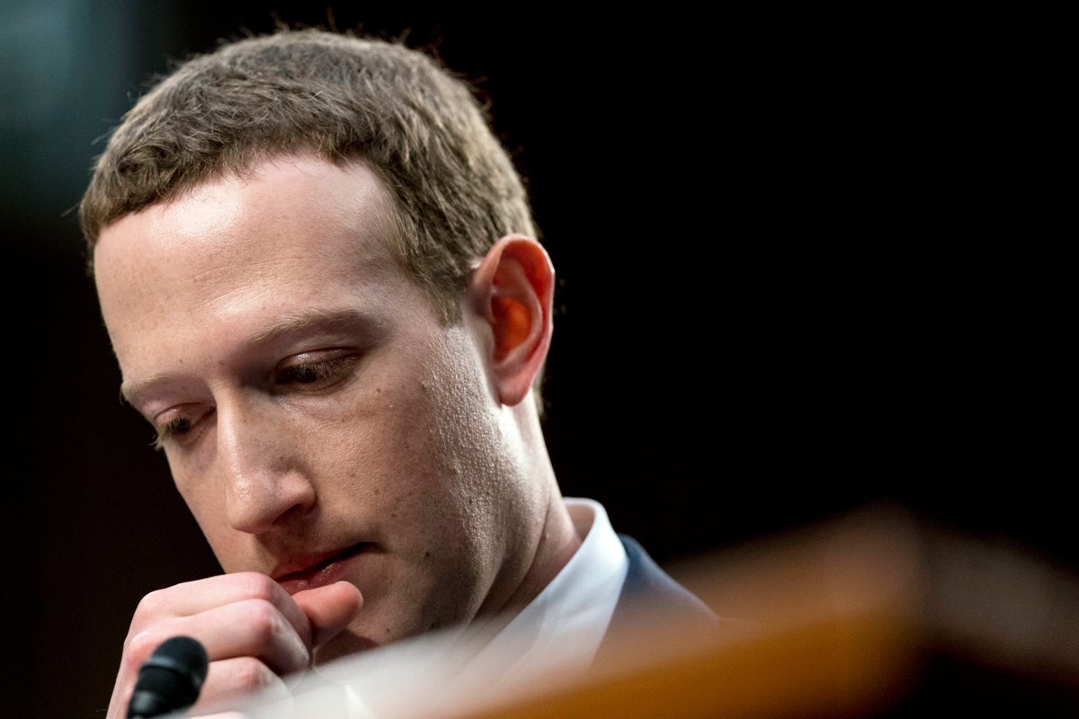 FILE - Facebook CEO Mark Zuckerberg pauses while testifying before a joint hearing of the Commerce and Judiciary Committees on Capitol Hill in Washington, Tuesday, April 10, 2018, about the use of Facebook data to target American voters in the 2016 election.
