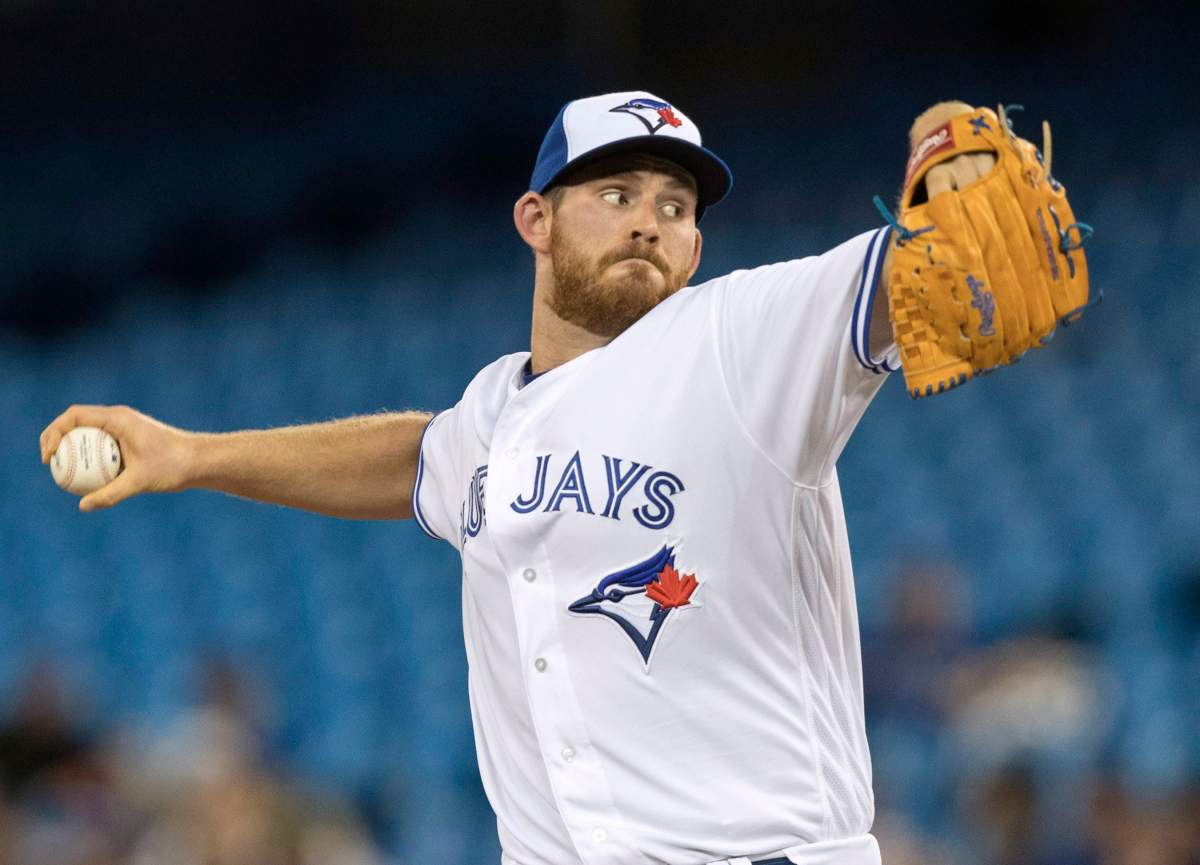 Toronto Blue Jays starting pitcher Joe Biagini throws in the second game of their American League MLB double header against the Kansas City Royals, in Toronto on Tuesday, April 17, 2018. 