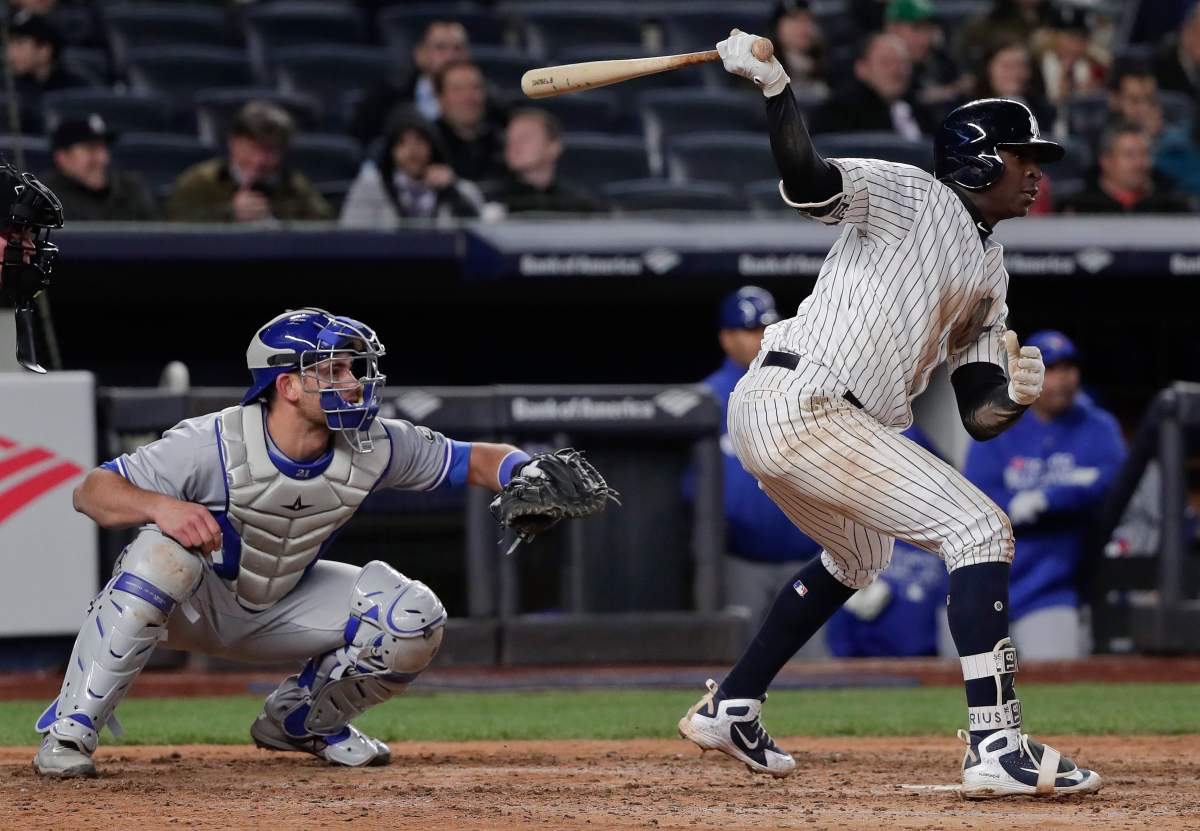 New York Yankees' Didi Gregorius watches his RBI base hit against the Toronto Blue Jays during the fifth inning of a baseball game Thursday, April 19, 2018, in New York.