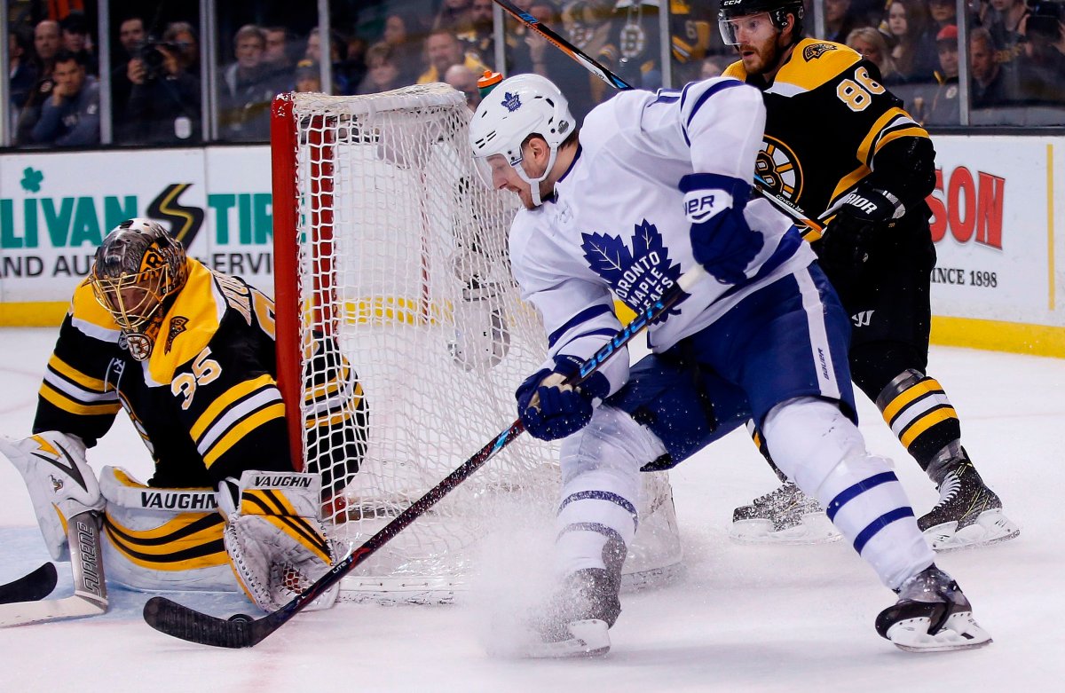 Boston Bruins' Anton Khudobin (35), of Kazakhstan, blocks a shot by Toronto Maple Leafs' Zach Hyman during the third period of Game 5 of an NHL hockey first-round playoff series in Boston, Saturday, April 21, 2018. The Maple Leafs won 4-3.