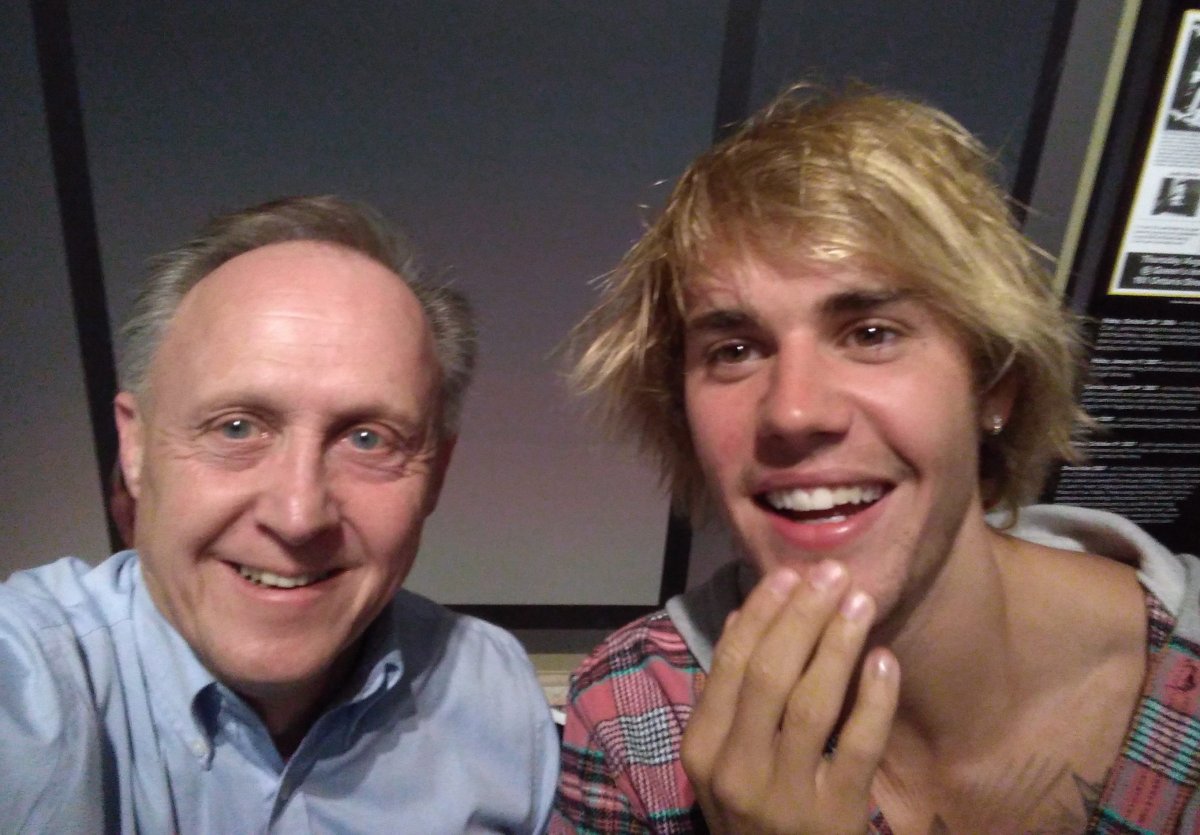 Justin Bieber poses for a photo with Stratford Perth Museum general manager John Kastner on Friday, April 27, 2018 in this handout photo.