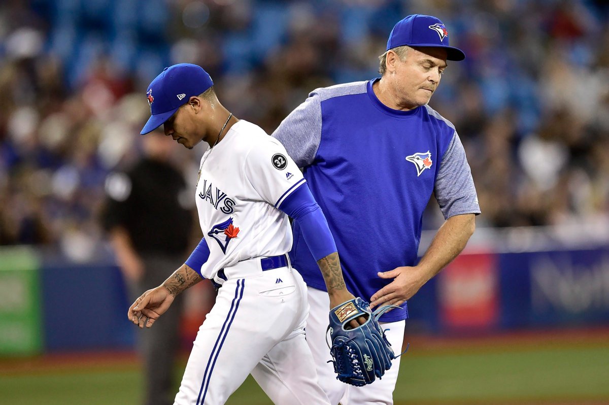 Toronto Blue Jays starting pitcher Marcus Stroman (6) is taken out of the game by manager John Gibbons against the Texas Rangers during sixth inning American League baseball action against the Texas Rangers in Toronto, Friday, April 27, 2018. 