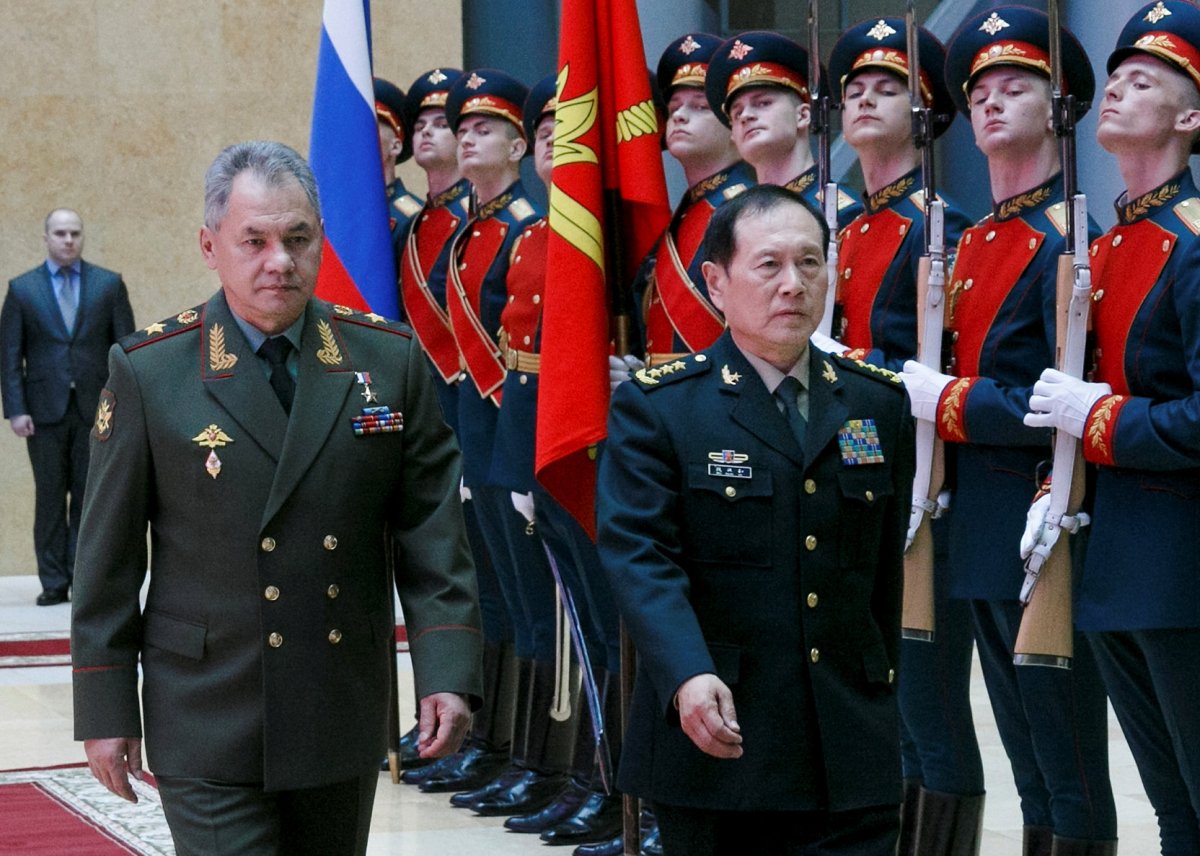 Russian Defense Minister Sergei Shoigu and Chinese Defense Minister Wei Fenghe review a honour guard prior to their talks in Moscow, Russia April 3, 2018.