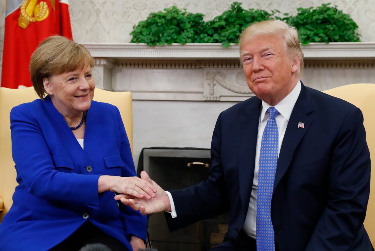 U.S. President Donald Trump meets with German Chancellor Angela Merkel in the White House Oval Office in Washington, U.S., April 27, 2018. 