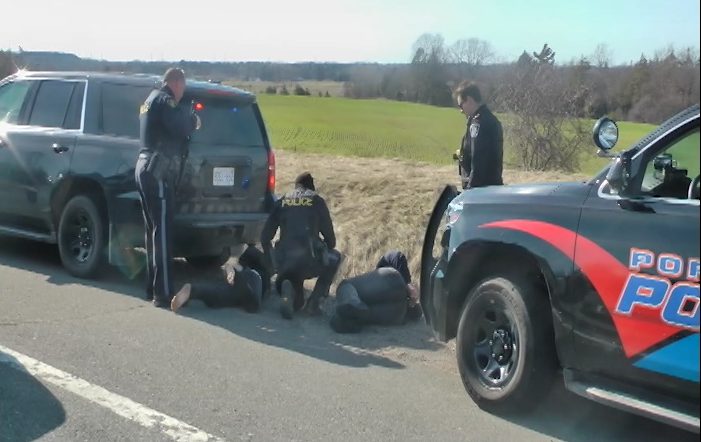 OPP and Port Hope Police conducted a takedown on Highway 401 on Sunday following reports of a man with a gun in a vehicle.