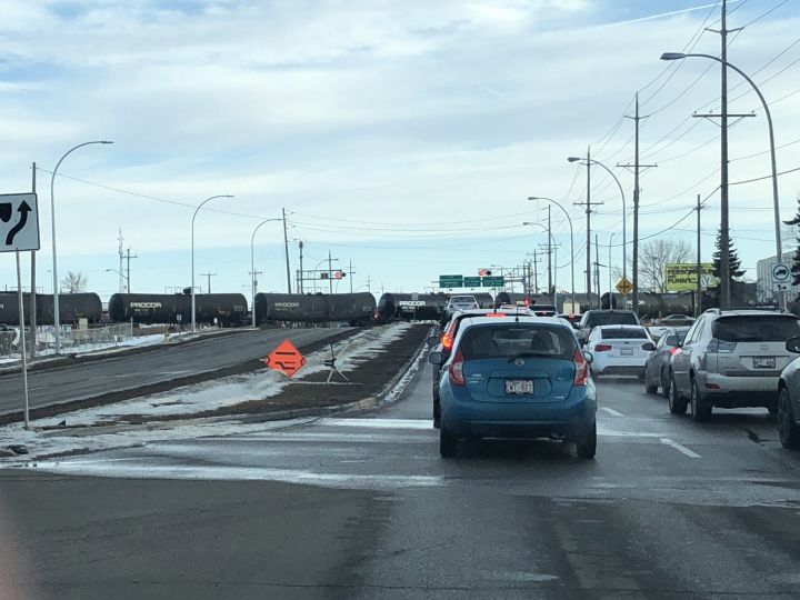 Traffic tied up due to a train on 50 Street near the Sherwood Park Freeway in Edmonton. 