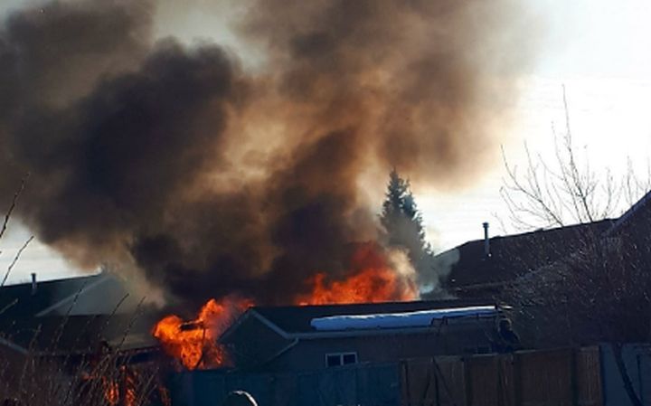 Some homes in Airdrie were being evacuated on Thursday evening as firefighters were battling a "large structure fire" in the 200 block of Tanner Drive, according to the RCMP.