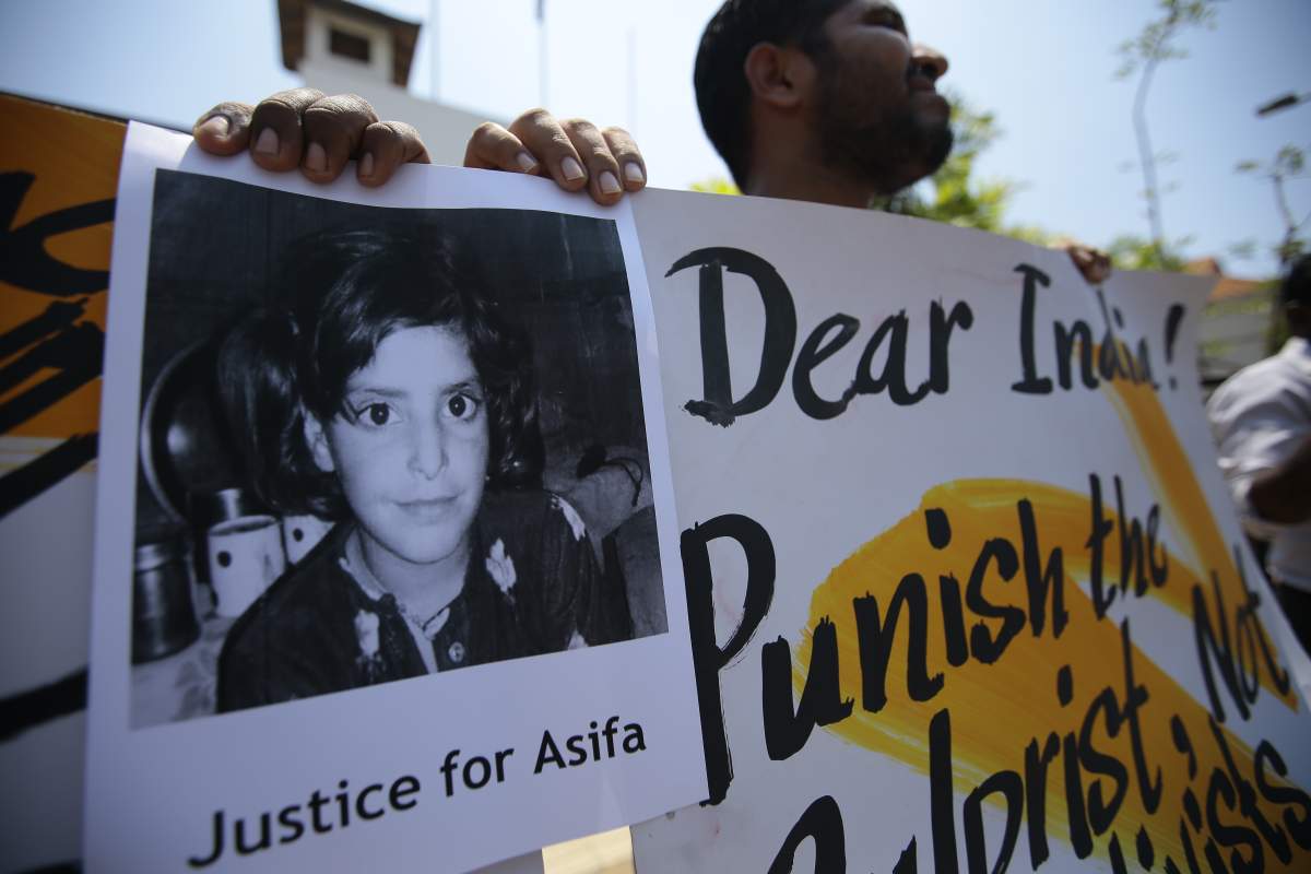 Sri Lankan civil rights activists stand in front of the High Commission of India during a silent vigil at Colombo, Sri Lanka on Monday 23 April 2018.The silent vigil was held demanding justice for the eight-year-old Indian girl, Asifa Bano who was brutally gang-raped and murdered after abduction in the state of Jammu and Kashmir in India.