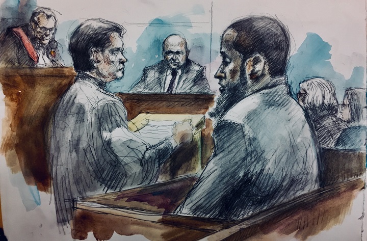 Ayanle Hassan Ali (right) appears in a Toronto court on April 9, 2018.