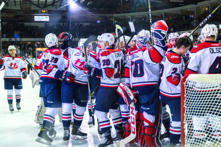 The Lethbridge Hurricanes celebrate together after a 6-4 series clinching win over the Red Deer Rebels Saturday night.
