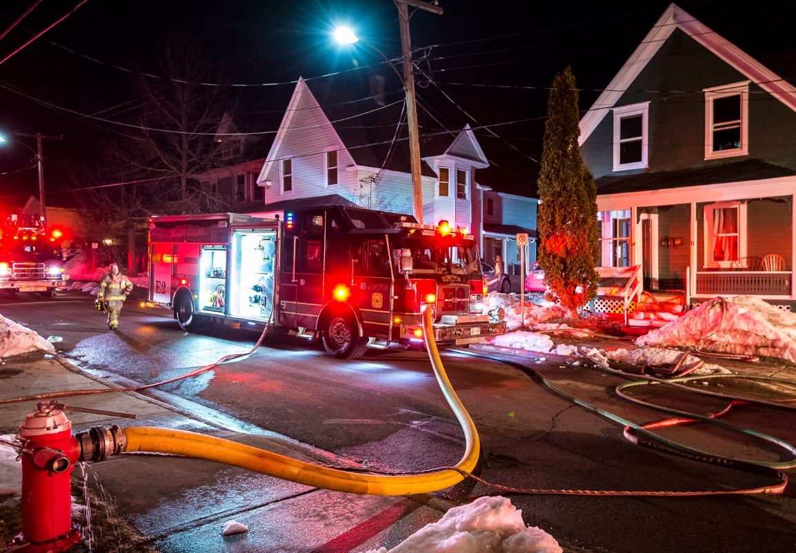 Fire forced out tenants at a two-storey house with three apartments on Dominion Street in Moncton on Saturday.