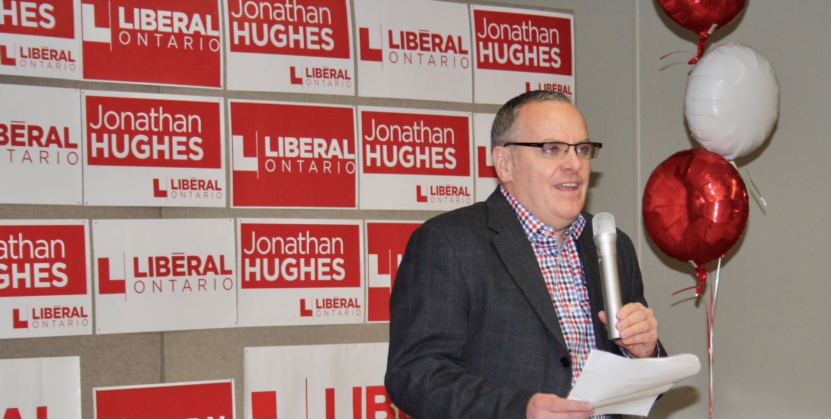 Hughes speaking at the announcement on Friday. 