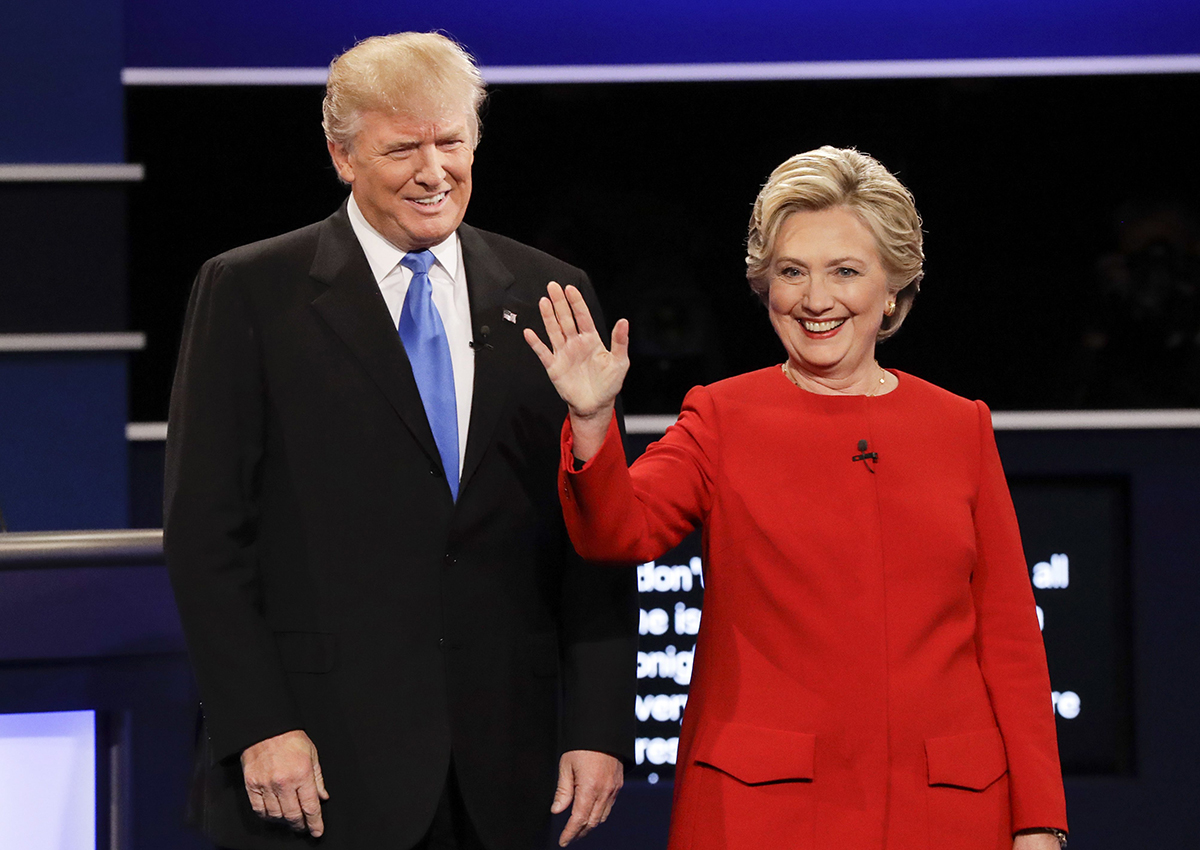  In this Sept. 26, 2016, file photo, then-Republican presidential nominee Donald Trump and then-Democratic presidential nominee Hillary Clinton are introduced during the presidential debate at Hofstra University in Hempstead, N.Y.