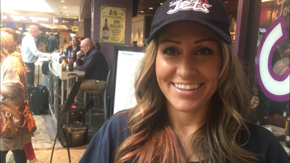 Country singer, and Winnipegger, Courtney Lynn greets travellers at Nashville's airport.