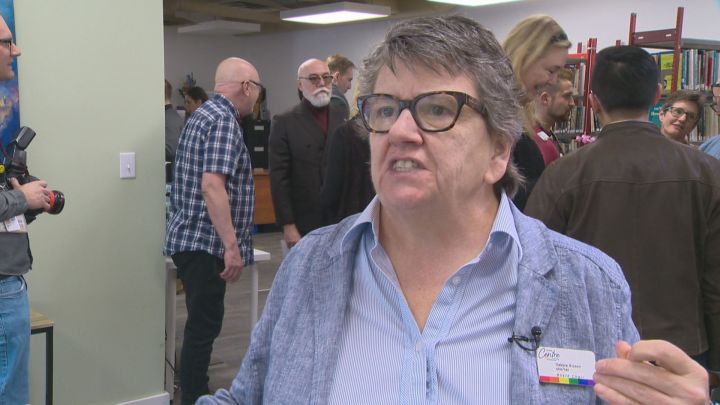 Debbie Bryson, the board chair of the Pride Centre of Edmonton, is seen at the centre's grand reopening on April 4, 2018.