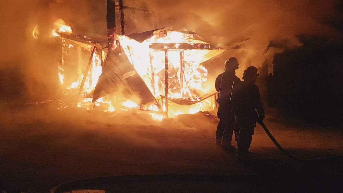 Firefighters battling the blaze at Fergie’s Cafe in Squamish. Credit: Jamie Williams