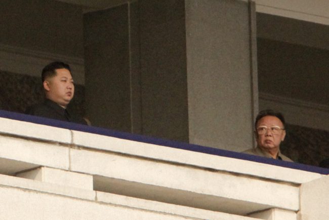 Kim Jong Il looks towards his son Kim Jong Un during a military parade in Pyongyang, North Korea, Oct. 10, 2010.