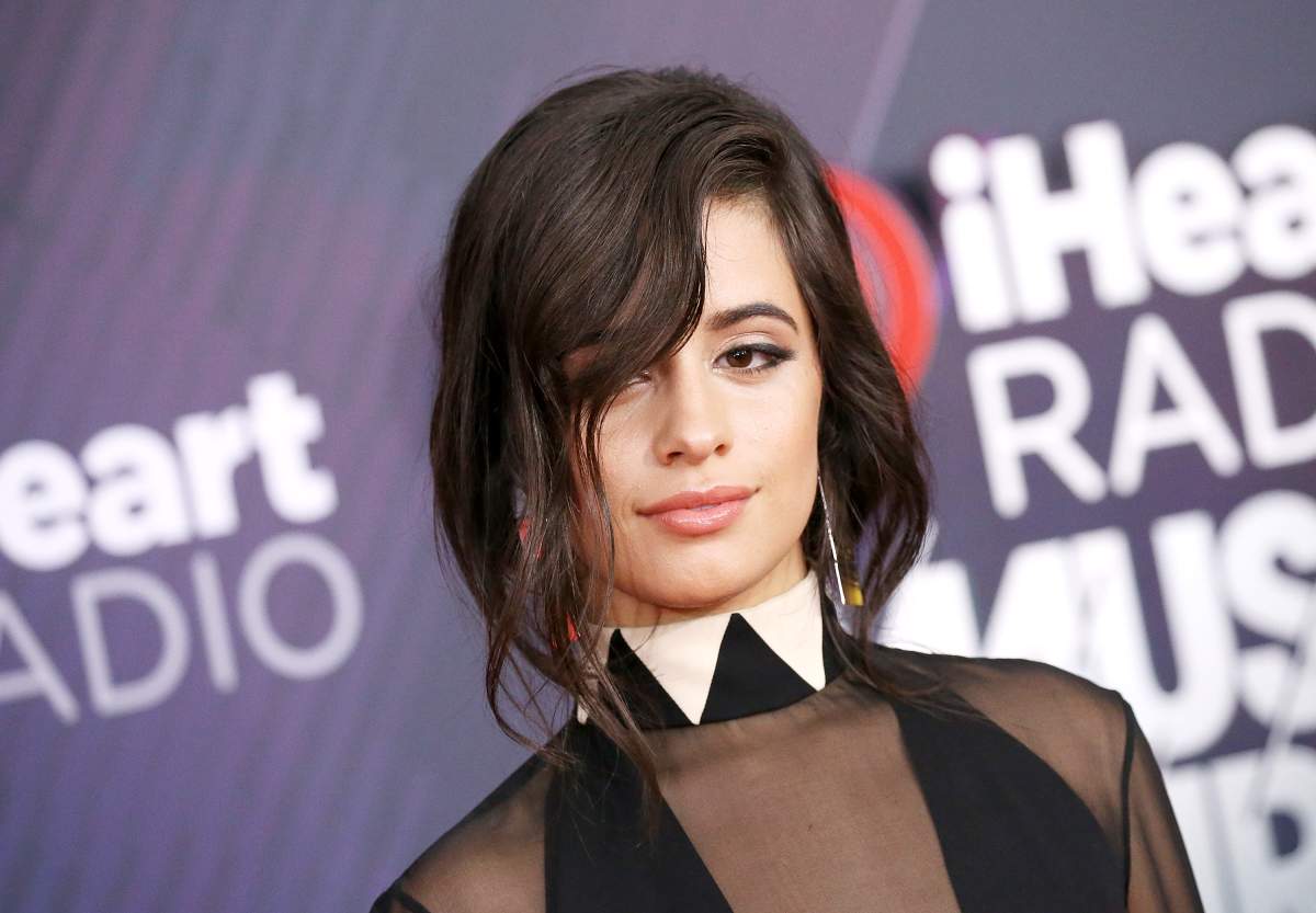 Camila Cabello arrives at the 2018 iHeartRadio Music Awards held at The Forum on March 11, 2018, in Inglewood, California.