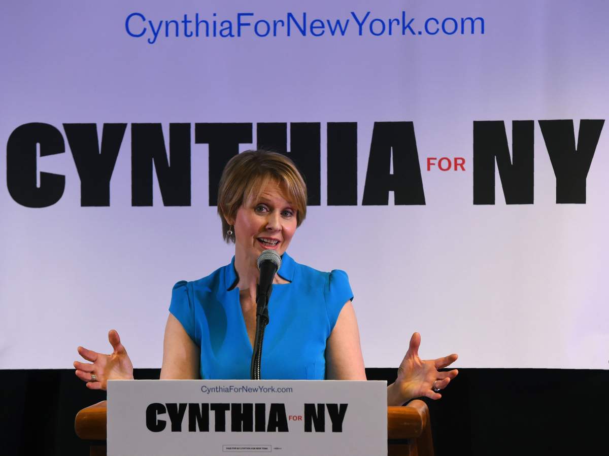 Former 'Sex and the City' star Cynthia Nixon speaks to people at the Bethesda Healing Center in  Brooklyn, New York on March 20, 2018 at her first event since announcing that shes running for governor of New York.