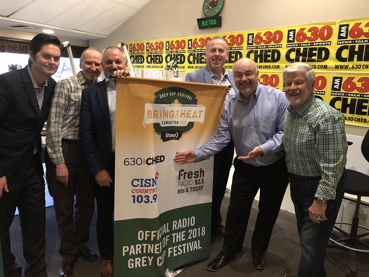 Duane Vinneau, Bruce Bowie, Brad Sparrow, Len Rhodes, Syd Smith and Bryan Hall celebrate the partnership between Corus Radio and the 2018 Grey Cup Festival.