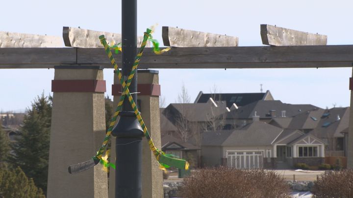 Hockey sticks on Logan Boulet’s street in Lethbridge, Alberta.