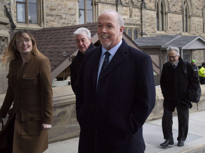 B.C. Premier John Horgan arrives on Parliament Hill before a meeting with Prime Minister Justin Trudeau and  Alberta Premier Rachel Notley, on the deadlock over Kinder Morgan's Trans Mountain pipeline expansion in Ottawa on Sunday, April 15, 2018. 