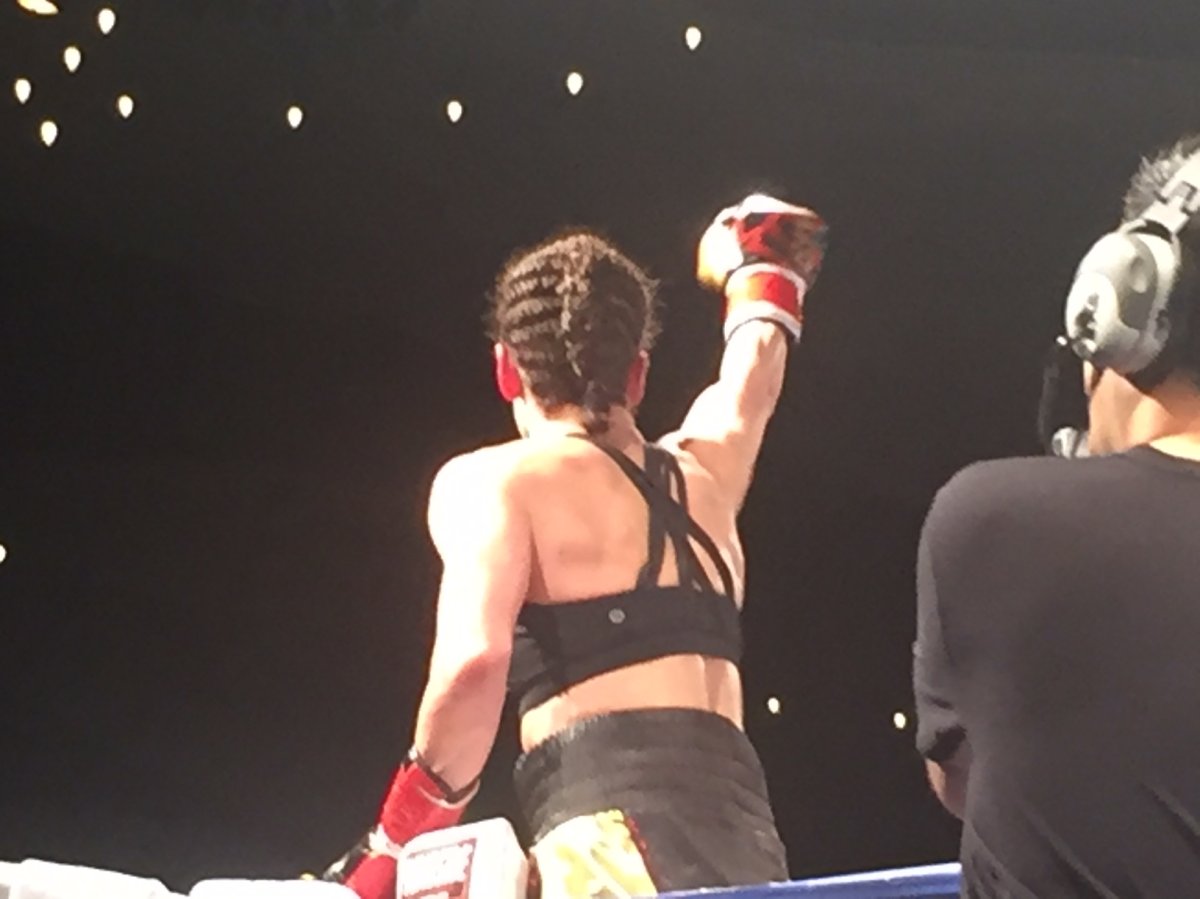 Edmonton boxer Jelena Mrdjenovich salutes the sold out crowd at the Shaw Conference Centre following her victory over Stephanie Ducastel on April 28, 2018.