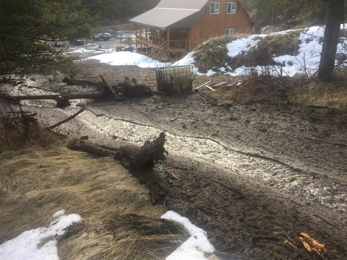 Okanagan mudslide misses home, wipes out shed - image