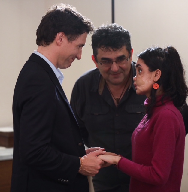 At left, Prime Minister Justin Trudeau, with Shakila Zareen at right and translator Kian Ghaffari.