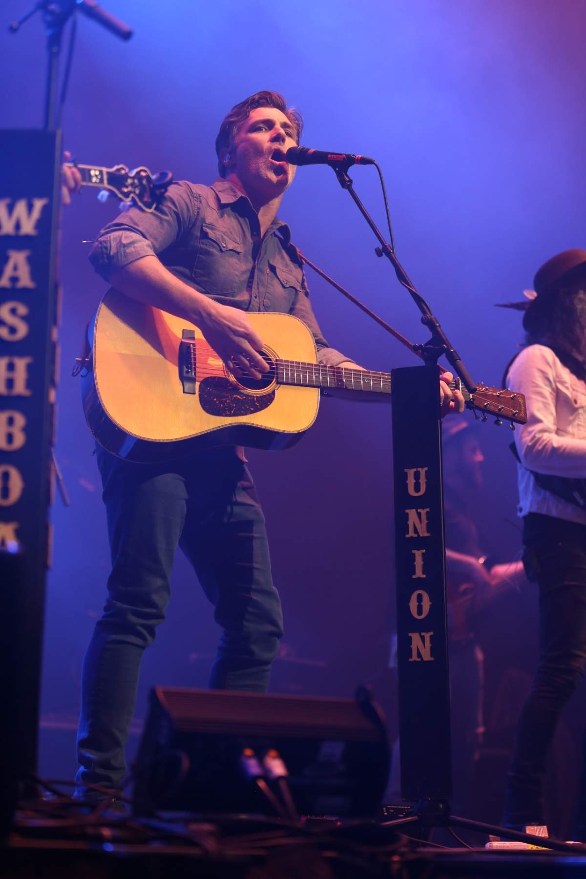 Aaron Grain of The Washboard Union performs at CISN Country 103.9.