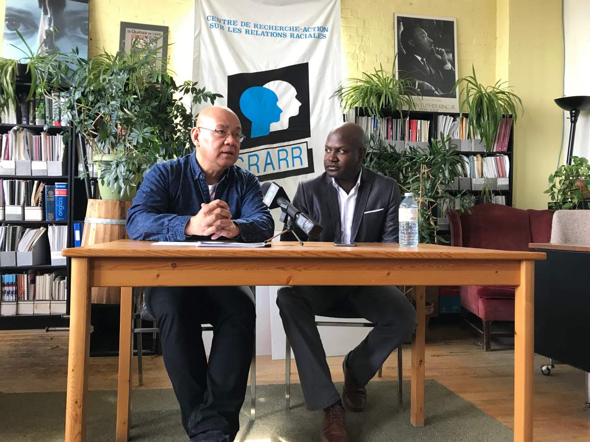 CRARR executive director Fo Niemi and resident Joel DeBellefeuille at a press conference on Tuesday, April 24, 2018.